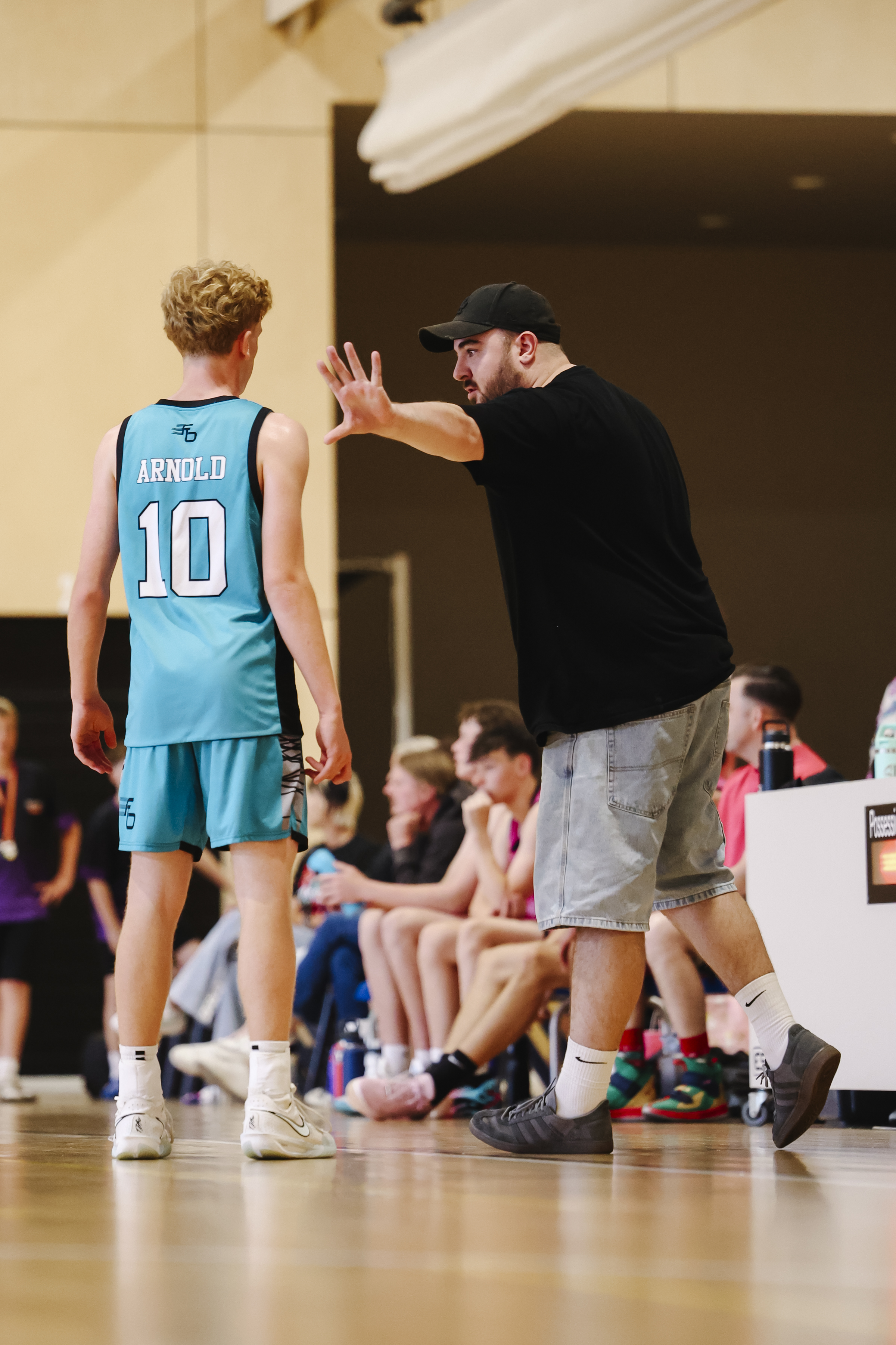 Coach instructing player